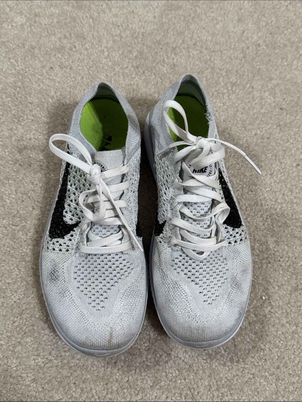 Nike White and Black Flyknit Athletic Shoes with Lime Insoles